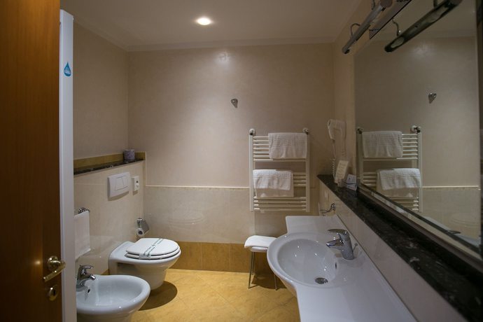 Imagen de la habitación del Hotel Le Grotte. Foto 8