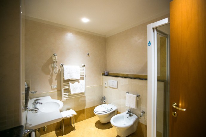 Imagen de la habitación del Hotel Le Grotte. Foto 10