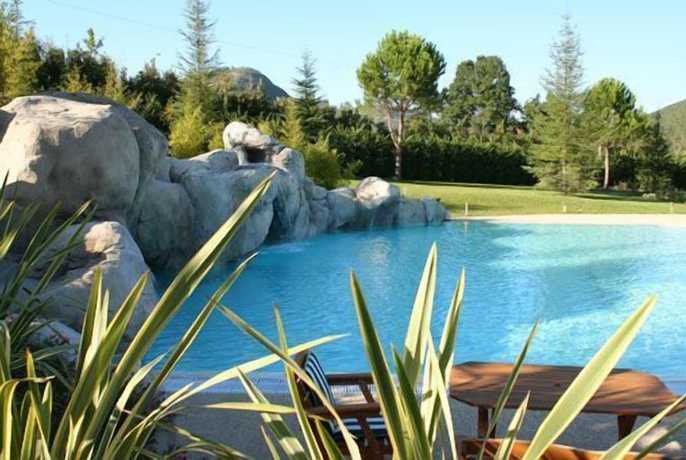 Imagen de la piscina del Hotel Le Grotte. Foto 18