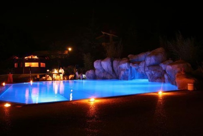 Imagen de la piscina del Hotel Le Grotte. Foto 19