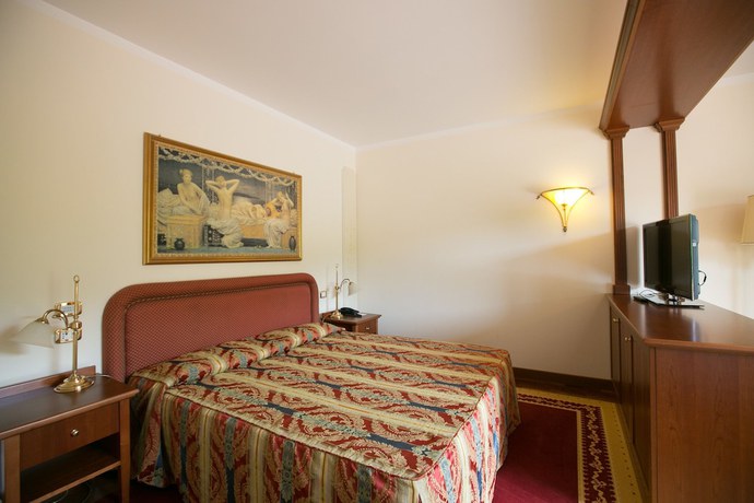 Imagen de la habitación del Hotel Le Grotte. Foto 12