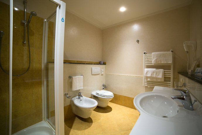 Imagen de la habitación del Hotel Le Grotte. Foto 14