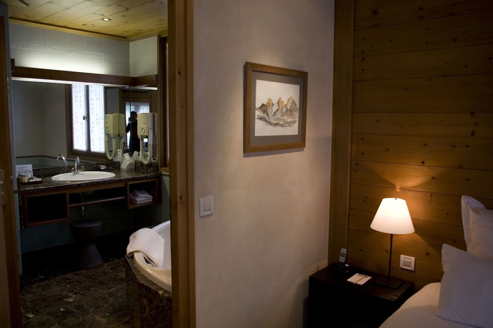 Imagen de la habitación del Hotel Le Hameau Albert 1er. Foto 9