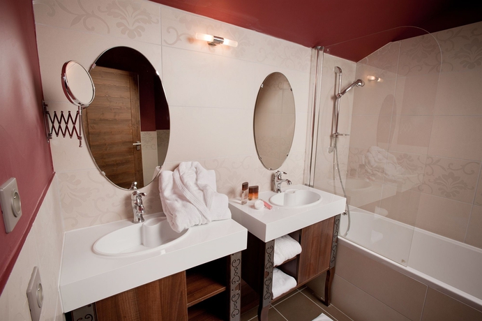 Imagen de la habitación del Hotel Le Hameau Du Kashmir, Val Thorens. Foto 10