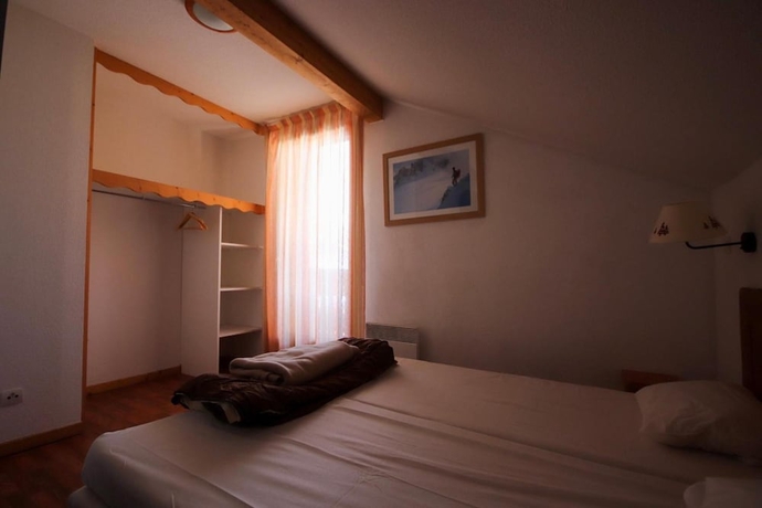 Imagen de la habitación del Hotel Le Hameau du Puy. Foto 12