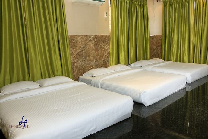 Imagen de la habitación del Hotel Le Holiday Inn. Foto 2