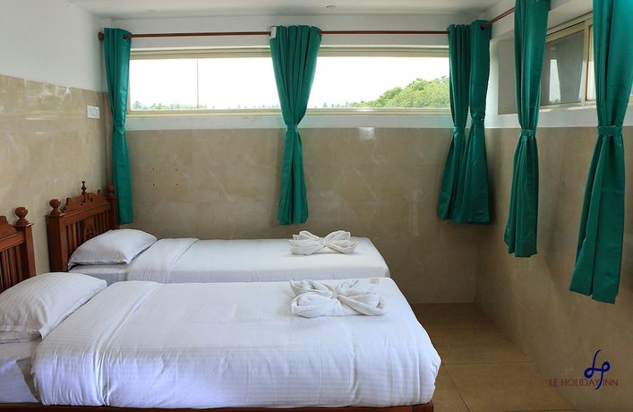 Imagen de la habitación del Hotel Le Holiday Inn. Foto 3