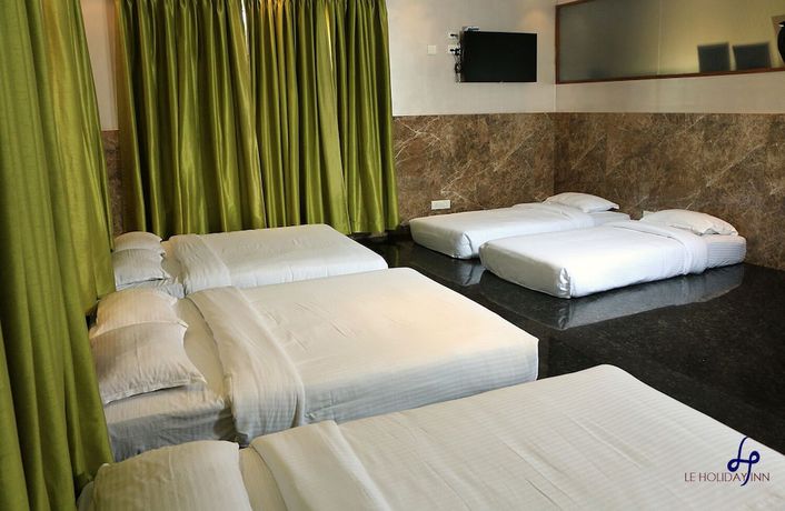 Imagen de la habitación del Hotel Le Holiday Inn. Foto 10