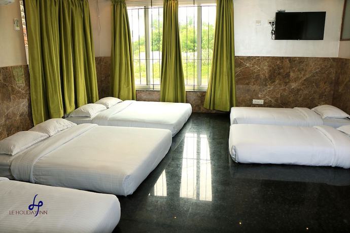 Imagen de la habitación del Hotel Le Holiday Inn. Foto 11