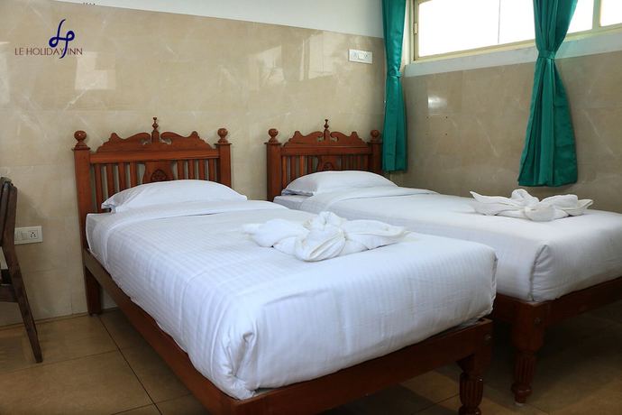 Imagen de la habitación del Hotel Le Holiday Inn. Foto 13