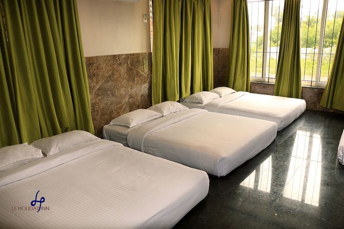 Imagen de la habitación del Hotel Le Holiday Inn. Foto 14