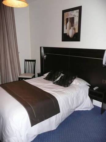 Imagen de la habitación del Hotel Le Home Saint Louis. Foto 7