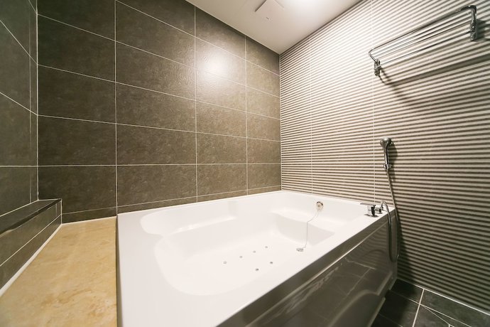 Imagen de la habitación del Hotel Le Idea. Foto 10