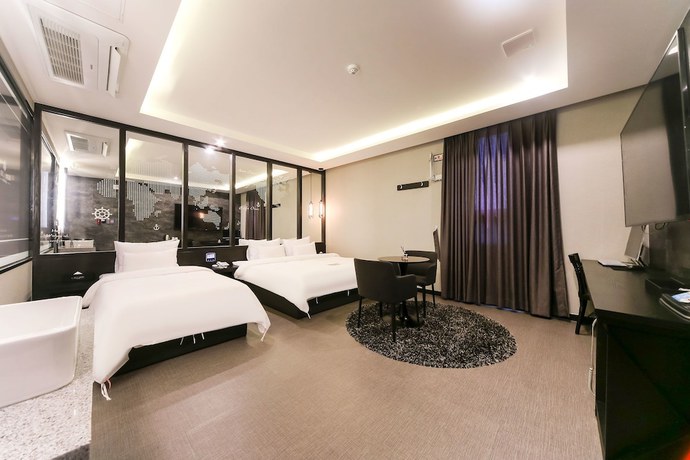 Imagen de la habitación del Hotel Le Idea. Foto 11