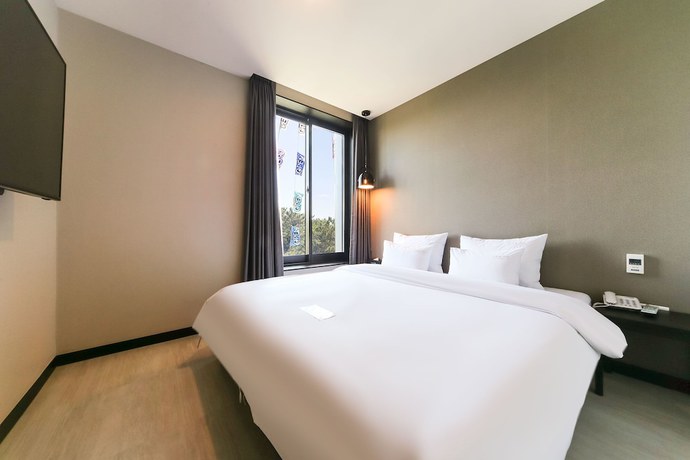 Imagen de la habitación del Hotel Le Idea. Foto 12