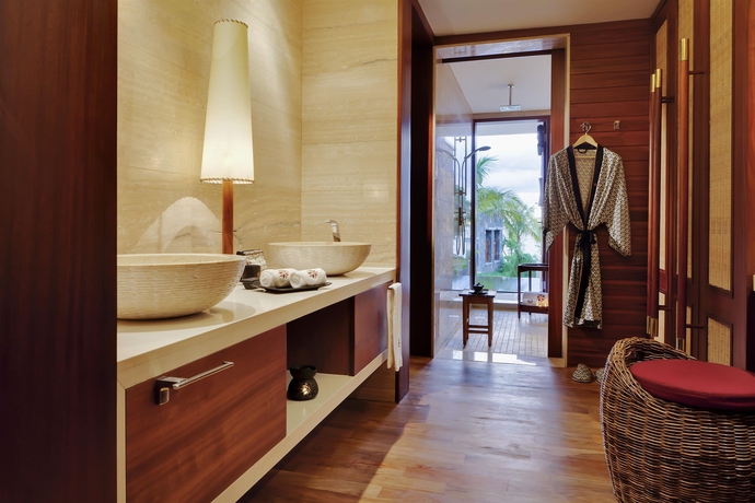 Imagen de la habitación del Hotel Le Jadis Beach Resort y Wellness Mauritius. Foto 7