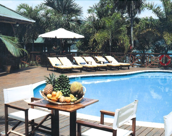 Imagen de la piscina del Hotel Le Jardin Des Palmes. Foto 17