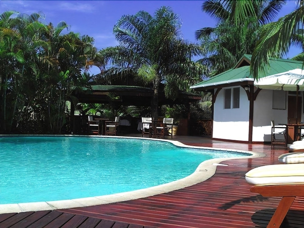 Imagen de la piscina del Hotel Le Jardin Des Palmes. Foto 18