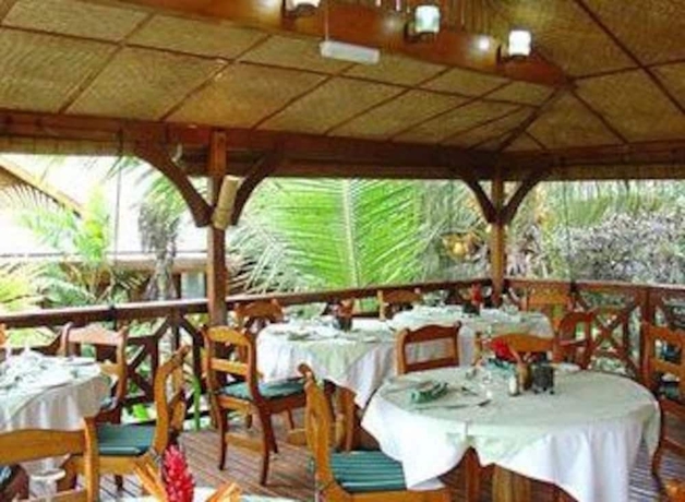 Imagen del bar/restaurante del Hotel Le Jardin Des Palmes. Foto 2