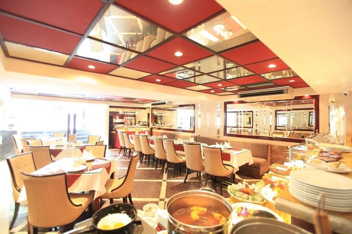 Imagen del bar/restaurante del Hotel Le Jardin Haute Couture. Foto 3