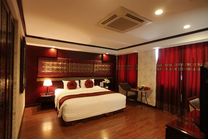 Imagen de la habitación del Hotel Le Jardin Haute Couture. Foto 6