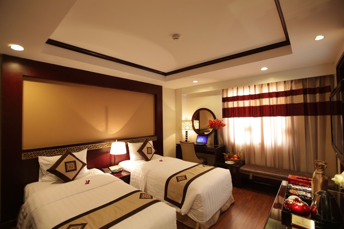 Imagen de la habitación del Hotel Le Jardin Haute Couture. Foto 7