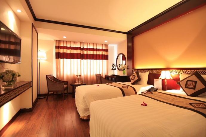 Imagen de la habitación del Hotel Le Jardin Haute Couture. Foto 8