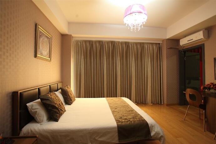 Imagen de la habitación del Hotel Le Jia Xuan International Convention Center Branch. Foto 4