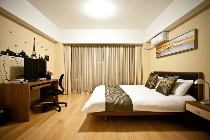 Imagen de la habitación del Hotel Le Jia Xuan International Convention Center Branch. Foto 9