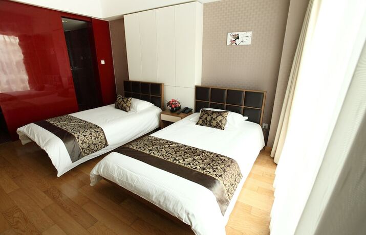 Imagen de la habitación del Hotel Le Jia Xuan International Convention Center Branch. Foto 10