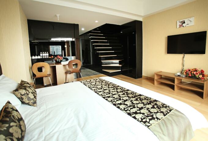 Imagen de la habitación del Hotel Le Jia Xuan International Convention Center Branch. Foto 11