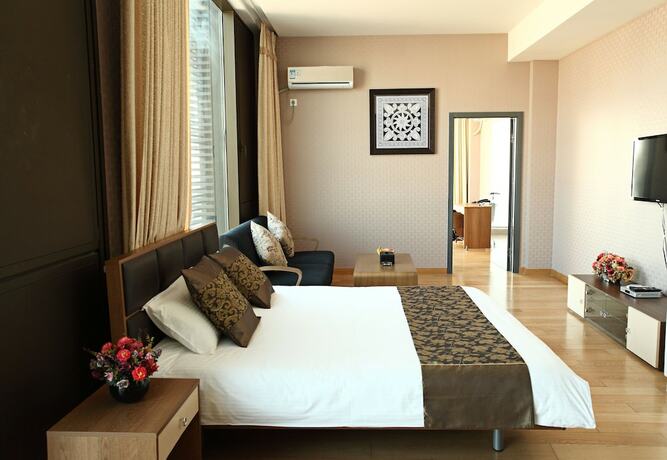 Imagen de la habitación del Hotel Le Jia Xuan International Convention Center Branch. Foto 13