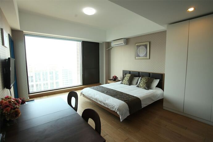 Imagen de la habitación del Hotel Le Jia Xuan International Convention Center Branch. Foto 15