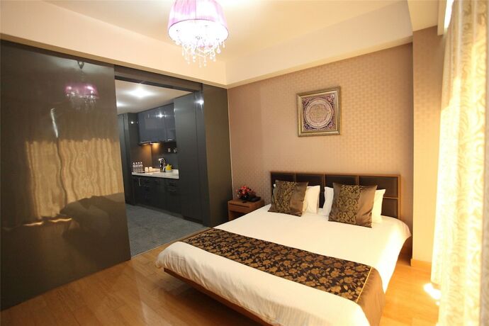 Imagen de la habitación del Hotel Le Jia Xuan International Convention Center Branch. Foto 17