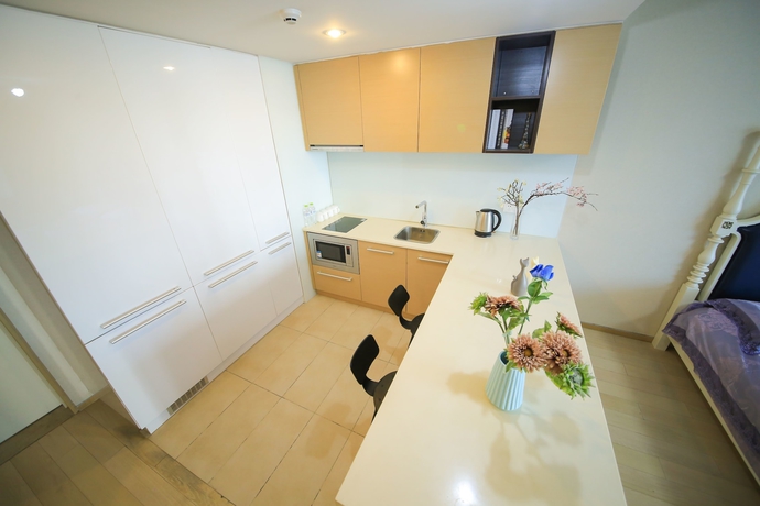 Imagen de la habitación del Hotel Le Jia Xuan Yuexi Apt Hk Central Rd Mixc. Foto 3