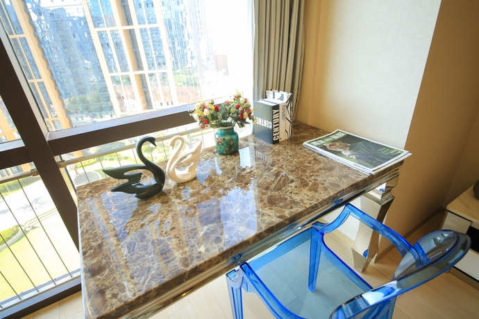 Imagen de la habitación del Hotel Le Jia Xuan Yuexi Apt Hk Central Rd Mixc. Foto 7