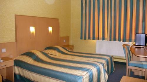 Imagen de la habitación del Hotel Le Joli Bois. Foto 10