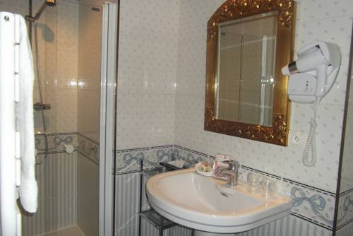 Imagen de la habitación del Hotel Le K'loys. Foto 14