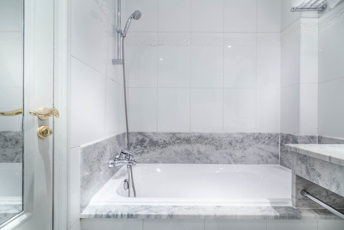 Imagen de la habitación del Hotel Le Lavoisier. Foto 15