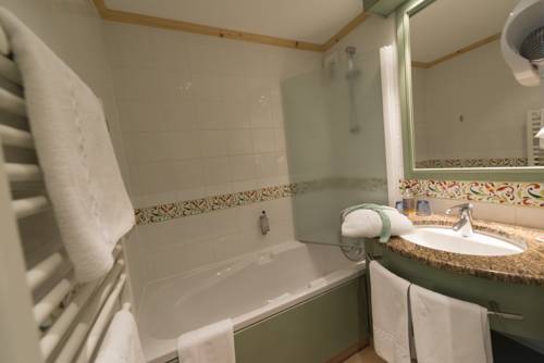 Imagen de la habitación del Hotel Le Levanna. Foto 14