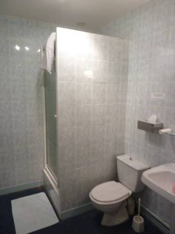 Imagen de la habitación del Hotel Le Limousin. Foto 11
