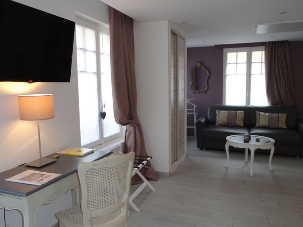 Imagen de los interiores del Hotel Le Lion D'or Et Restaurant La Table Du Lion. Foto 14