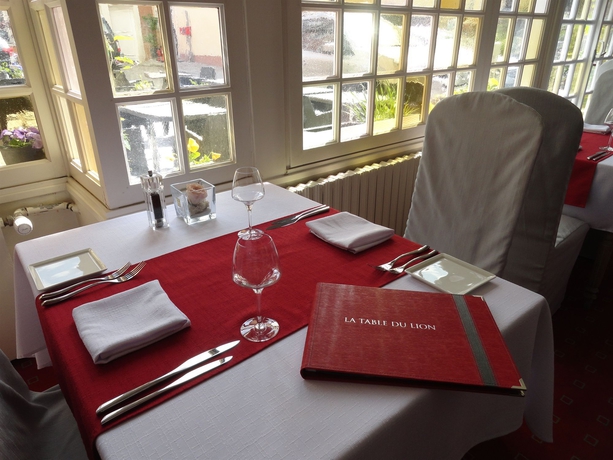 Imagen del bar/restaurante del Hotel Le Lion D'or Et Restaurant La Table Du Lion. Foto 3