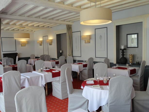 Imagen del bar/restaurante del Hotel Le Lion D'or Et Restaurant La Table Du Lion. Foto 4