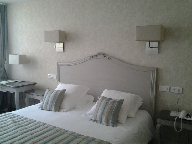 Imagen de la habitación del Hotel Le Lion D'or Et Restaurant La Table Du Lion. Foto 10