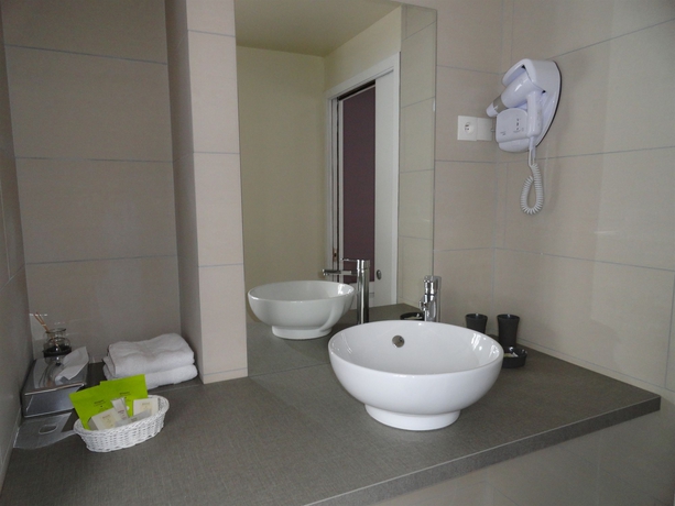 Imagen de la habitación del Hotel Le Lion D'or Et Restaurant La Table Du Lion. Foto 12