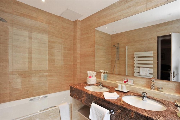 Imagen de la habitación del Hotel Le Littré. Foto 7