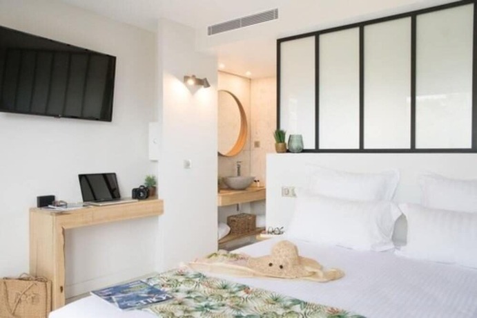 Imagen de la habitación del Hotel Le Lodge des Iles d\'Or. Foto 16