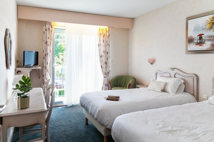 Imagen de la habitación del Hotel Le Logis de Brou. Foto 18