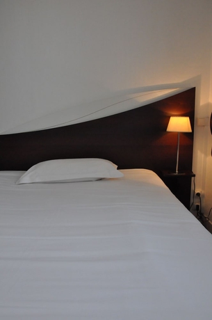 Imagen de la habitación del Hotel Le Lorient. Foto 11